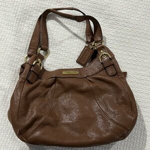Brown leather Coach purse